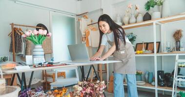 Small business owners inspecting merchandise And talk to customers to buy products and take orders that customers order from online retailers - online shopping. photo