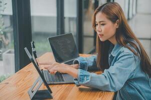 Female programmers are thinking and planning to work on programming, software coding and web design.Concept technology development. photo