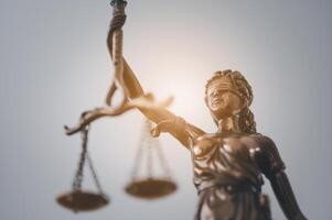 Lady justice,Law theme, mallet of the judge, law enforcement officers, evidence-based cases and documents taken into account. photo