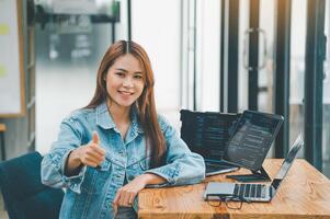 Female programmers are happily working on software coding and web designing.Concept technology development. photo
