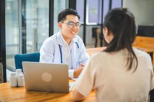 Doctors are inquiring about the patient's symptoms, notifying the results of the physical examination, and recommending treatment and health care. photo