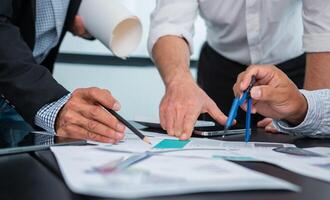 Business people team work while working in board room, design project, discussing ideas,discuss financial statistics together teamwork concept photo