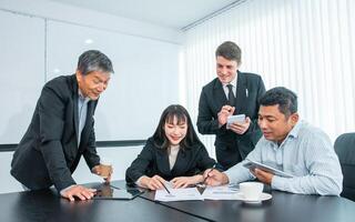 Business people team work while working in board room, design project, discussing ideas,discuss financial statistics together teamwork concept photo