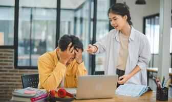 Young students quarrel when their work fails and goals are not met. , communication does not understand each other photo