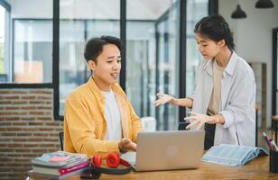 Young students quarrel when their work fails and goals are not met. , communication does not understand each other photo