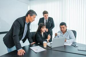 Business people team work while working in board room, design project, discussing ideas,discuss financial statistics together teamwork concept photo