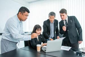 Business people team work while working in board room, design project, discussing ideas,discuss financial statistics together teamwork concept photo