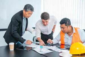 Business people team work while working in board room, design project, discussing ideas,discuss financial statistics together teamwork concept photo