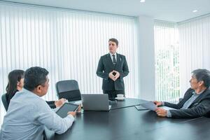 Business people team work while working in board room, design project, discussing ideas,discuss financial statistics together teamwork concept photo