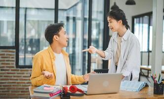 Young students quarrel when their work fails and goals are not met. , communication does not understand each other photo