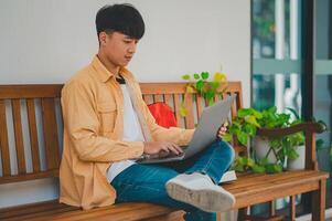 Students are doing research and finding knowledge on the internet on laptops in the university area. photo