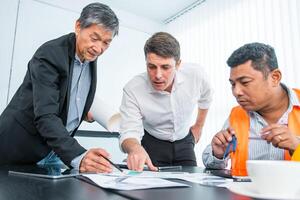 Business people team work while working in board room, design project, discussing ideas,discuss financial statistics together teamwork concept photo
