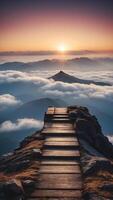 A mountain peak above the clouds with a glowing empty platform at the summit. photo