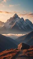 A mountain range that defies gravity, its peaks floating above the clouds. photo