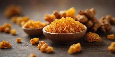 Turmeric root and honeycomb on a bright background. photo