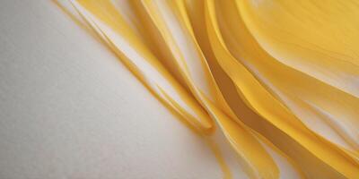A bright yellow background with abstract white brushstrokes across the surface. photo