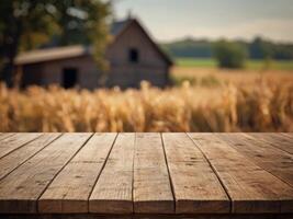 Background of a blurry farm field and a rustic wooden table. photo
