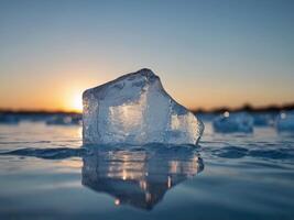 ice berg floating in water under blue sky. photo