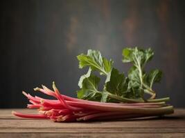 Fresh Organic Rhubarb Stems on Rustic Table. photo