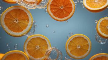 Citrus Fruit Slices Submerged in Water with Bubbles. photo