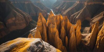 Aerial View of a Canyon with Yellow and Gray Rock Formations. photo