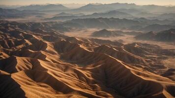 Aerial View of a Rugged Desert Landscape with Dramatic Ridges and Shadows. photo