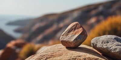 A tight shot of a rock with a hazy sky in the background. photo