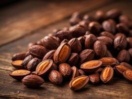 Closeup of Cocoa Beans on Rustic Wooden Surface - Organic Aesthetic with Copy Space. photo