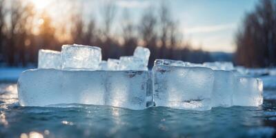 A bridge made of ice is floating over a frozen river. photo