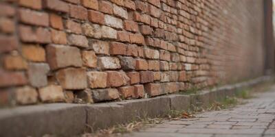 Close up image of deteriorating brick wall on deserted building for background. photo