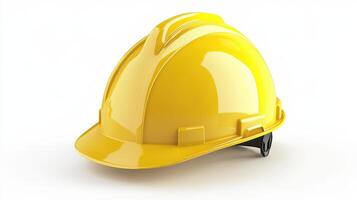 Construction helmet in yellow set against a white backdrop. photo
