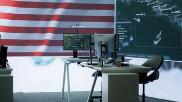 Empty army command center with big data presents the American flag, top secret armed forces agency protecting the country from threats. Monitoring room with high tech gear. Camera A. photo