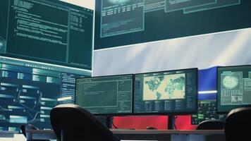 Surveillance and hacking room with a Russian flag on big screen, representing cyber espionage and digital manipulation. Russian government works on propaganda and misinformation campaigns. Camera B. photo