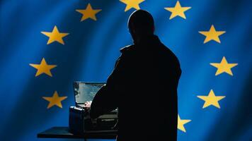 EU air defense operator arrives in control room, uses radar detecting missile attacks, conducting satellite tracking. European Union alliance agent uses military software preventing rockets, camera B photo
