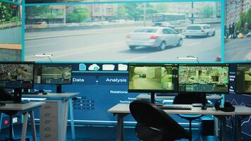 General defense offices with satellite based CCTV network uses real time surveillance images to monitor highway traffic. Administrative transmission and reconnaissance services in observation room. photo