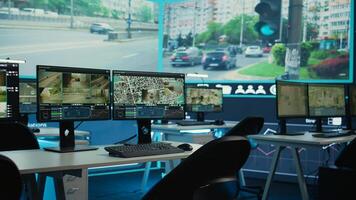 Government satellite CCTV system in empty monitoring room with traffic surveillance via footage. Public safety on the highways ensured by the national security department offices. photo