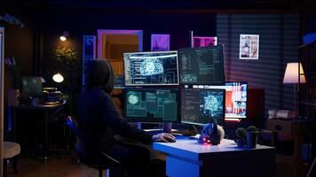 Hacker running artificial intelligence spyware software designed to gather information from users computers without their knowledge. Scammer commits fraud using AI, camera B photo
