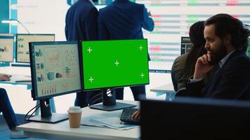 General director reads insight about a new expansion strategy on pc, mockup screen in enterprise office. Analyst presenting reports and infographics to analyze business activity status. Camera A. photo