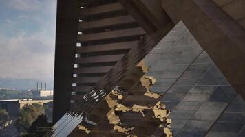 A building's reflection in the windows of another building video