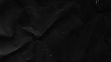 Abstract background paper texture dark background with noise grain, stop motion paper background video
