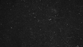Paper texture dark background with noise grain, Seamless looped stop motion Abstract background video