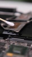 vertical Process removing thermal paste with cotton from cooling system video