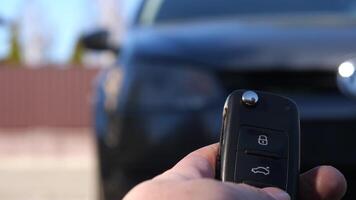 close-up Locking and unlocking the car by the car's key remote control video