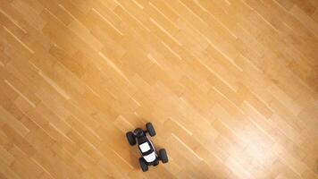 top view of a model of a radio-controlled rc car truck with a remote control video