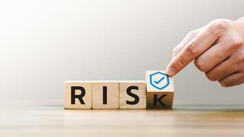 Risk Management Concept with Protective Measures Symbolized by Blocks, Prevention Strategy with Shield Icon, Emphasizing Proactive Measures for Business Security, Risk Mitigation, Financial Stability. photo