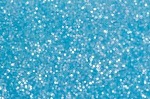 Defocus light background blue with white. Blurred glitters, sparkles shine, bokeh. photo
