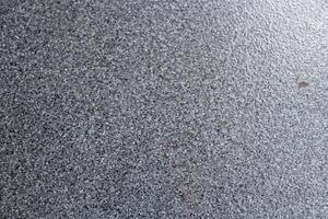 Close-up of a textured grey surface. photo