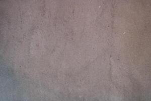 Close-up of a textured, grey surface. photo
