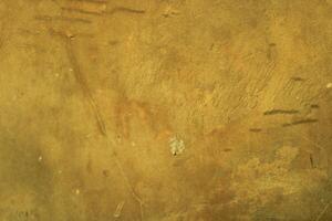 Close-up of textured gold surface. photo