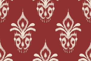 Red and cream seamless ikat fabric pattern with floral and geometric patterns. Traditional textile design for fabric, wallpaper and home decor. Abstract ethnic print. vector